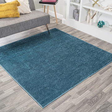 Haze Solid Low-pile Area Rug Turquoise